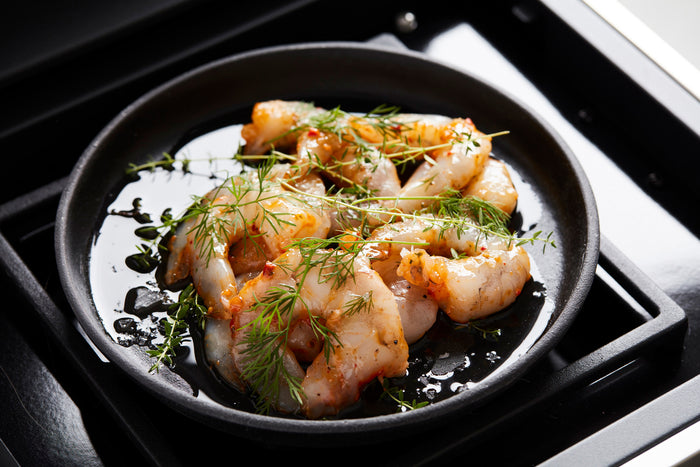 Barbecook gietijzeren grillpan met onderlegger uit bamboe